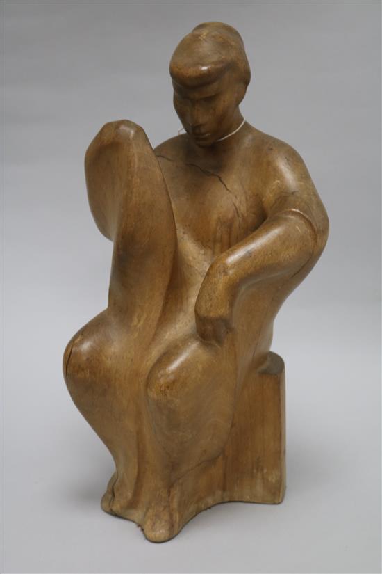 A carved wood figure